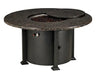 A round outdoor fire table with a granite top and a black metal base. The table has a circular burner and a control panel with a knob and a switch. A granite lid covers the burner, and a door on the side of the base reveals a storage compartment.