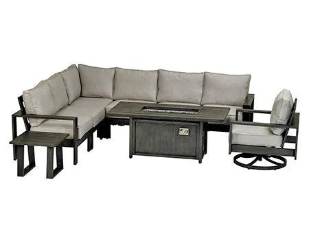 A 9-piece outdoor sectional seating set with a rectangular fire table in the center. The set includes a large L-shaped sectional sofa, two armchairs, a swivel chair, and two square accent tables. The fire table has a gray finish and a glass top with flames visible. The cushions are beige and the frame is dark gray.