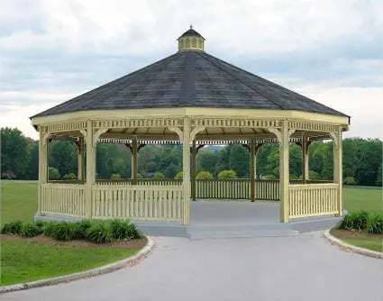 A whimsical octagonal gazebo with a cupola, decorated with fairy lights and lanterns