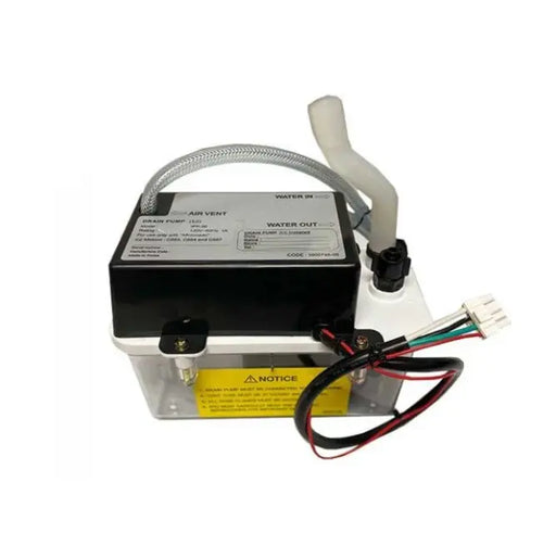 A black and white drain pump for an ice maker. It has a clear plastic cover that shows the inner workings of the pump. There are several hoses and wires attached to the pump, as well as a small label that says "Water Out."