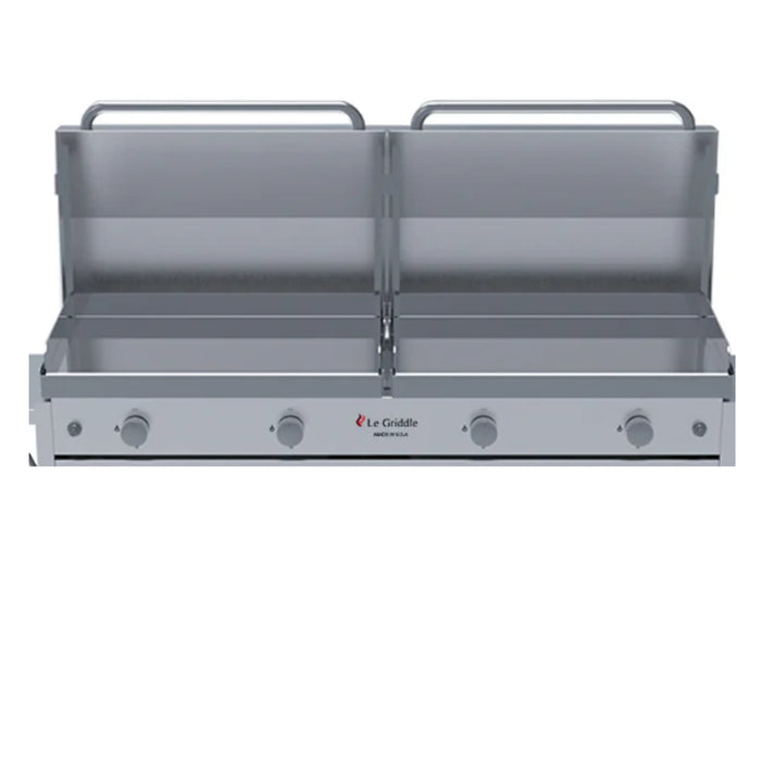 A Le Griddle gas griddle featuring two separate cooking surfaces, each with its own set of controls and a center handle for easy transport