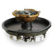 A black, round metal fire pit with a stainless steel burner in the center. The fire pit is sitting on a round, black plastic base. There is a metal ring around the top of the fire pit with four water spouts coming out of the side.