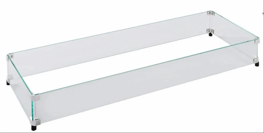 A close-up image of a rectangular glass wind guard for a fire pit. The wind guard is made of thick, clear glass and has polished aluminum brackets on either side. It sits on a white background.