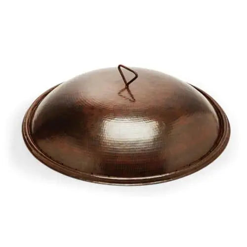 Round, hammered copper fire pit lid with a handle