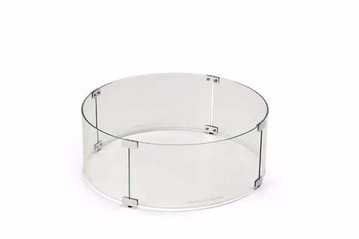  A round glass wind guard for a fire pit. The guard is made of clear tempered glass and has a polished aluminum frame. It is designed to protect the fire from wind and debris. The guard is easy to install and remove. The glass is 3/16 inch thick and can withstand high temperatures. The wind guard is made by HPC Fire. The wind guard has a beveled edge and a "Caution Hot Surface" warning etched into the glass. The wind guard is 38 inches in diameter and 6 inches high.