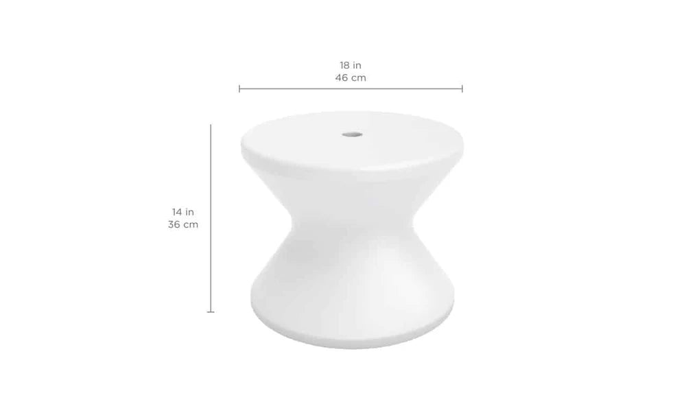 A line drawing of a white, round poolside table with a wide base and a slightly tapered top. The table has a small hole in the center. Dimensions are labeled in inches and centimeters.