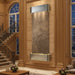 Decorative in door wall fountain by adagio in a luxurious interior setting with wooden paneling and staircase.
