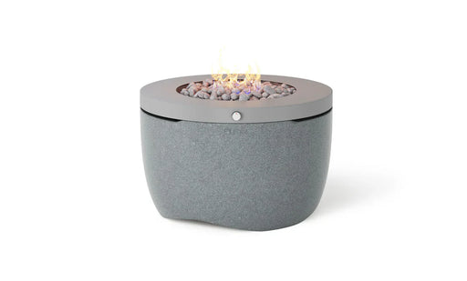 Ledge Lounger Halo 40-inch Outdoor Propane Fire Pit in a gray speckled finish, ignited with a flame burning in the center.