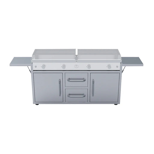 A stainless steel outdoor kitchen station with a built-in griddle. The griddle has two cooking surfaces, four burners, and control knobs. The station has two doors and two drawers for storage, and two folding side shelves.