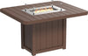A sturdy square-shaped outdoor dining table with a built-in fire pit. The table is made of weather-resistant brown material and has a glass wind guard to protect the flame.