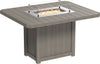 Durable outdoor fire pit table, perfect for entertaining guests. Features a weather-resistant design, glass wind guard, and propane-powered fire pit.