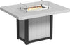Outdoor fire pit table with glass wind guard.