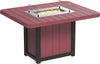 A rectangular outdoor dining table with a built-in fire pit. The table is made of weather-resistant red material with black accents and has a glass wind guard to protect the flame.