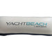 White pillow with 'YACHT BEACH by Spinera' branding on a white background