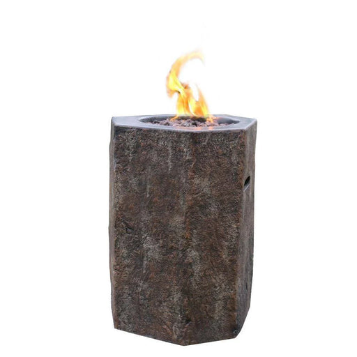 hexagon concrete propane fire column is lit on lava rocks on a white background