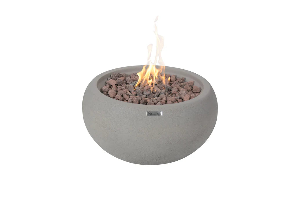 modeno newbridge round propane fire bowl and round gas fire bowl OFG138 in light gret burning on brown lava rocks 