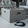 square fire pit with glass windscreen and start and stop ignition button and 10ft hose side view