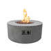 light grey round fire pit table is lit on brown lava rocks with clear view of start and stop button of fire pit on a white background