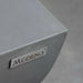 modeno logo on square ceramic fire pit table close up