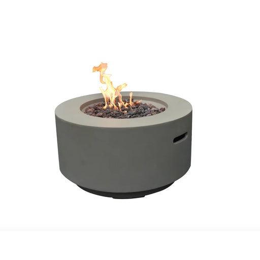 round fire pit table with yello and orange flamed burning on brown lava rocks on a white background