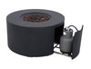 Dark gray, round fire pit table with lava rocks in the center. A propane tank is visible through a sliding door on the side of the table.