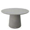  Elementi Home Rio 48" Round Outdoor Dining Table in grey. The table would be the central focus, displaying its round shape and the grey finish, possibly with a concrete-like texture as is common with Elementi Home's outdoor furniture.