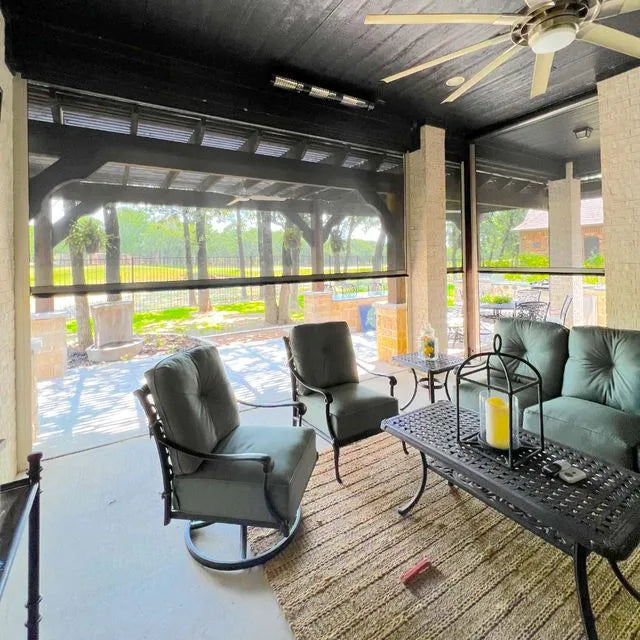 Outdoor patio area with furniture and a ceiling fan