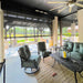 Outdoor patio area with furniture and a ceiling fan