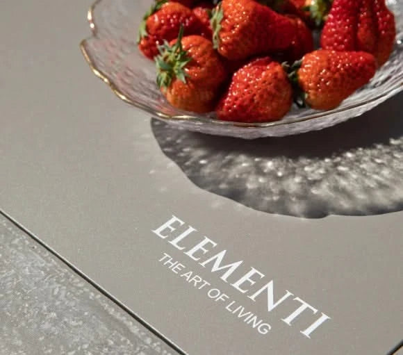 elementi logo on rectangular fire pit table top close up