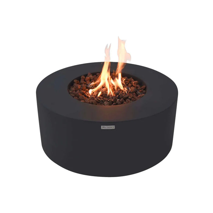 round fire pit table on brown lava rocks. fire pit is lit and elementi logo is on fire pit table on a white background