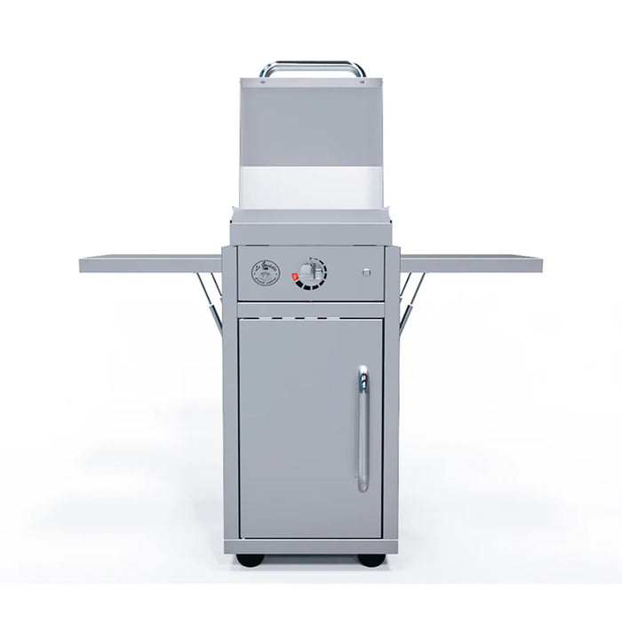 An image of a stainless steel outdoor grill cart. The cart has a closed cabinet with a door, two retractable side shelves, and four wheels. A grill is mounted on top of the cart, with a hinged lid open to reveal the cooking surface.