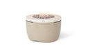 Beige Ledge Lounger Halo 40-inch Outdoor Propane Fire Pit with a flame burning in the center bowl.