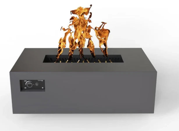 A gray rectangular gas fire pit table with flames burning inside. A control panel is located on the bottom left side.