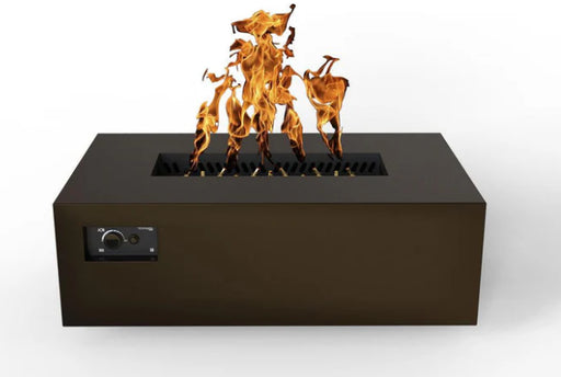 A bronze rectangular gas fire pit table with flames burning inside. A control panel is located on the bottom left side.