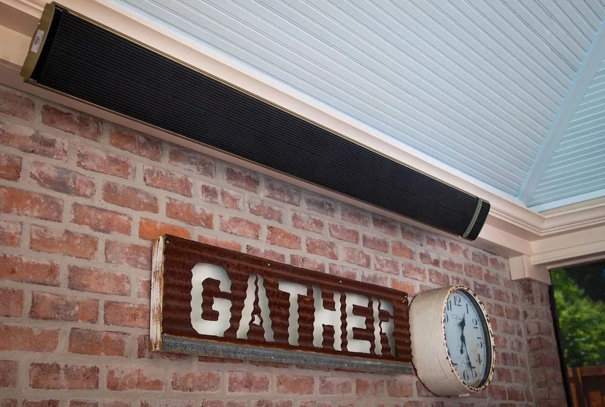 Brick wall with a 'GATHER' sign and clock with a wall mounted wifi heater