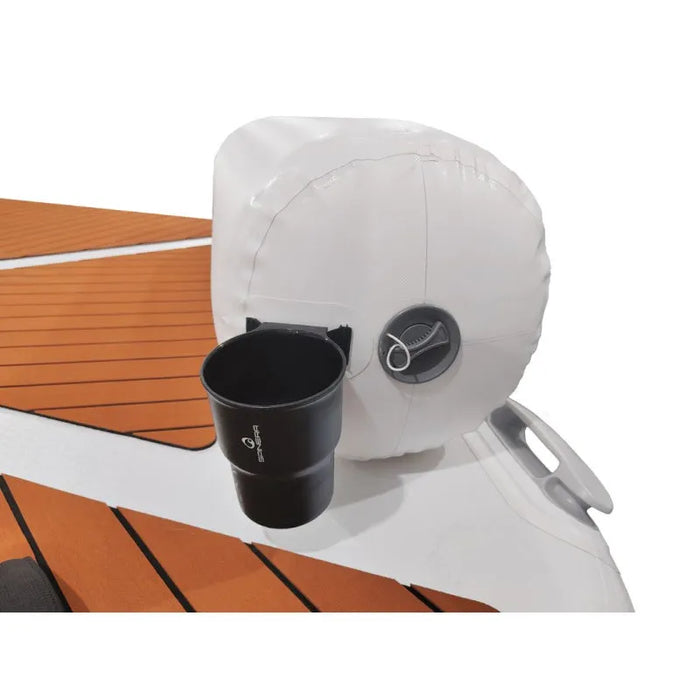 Inflatable boat seat with cup holder and black cup on a white background