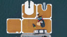 Top-down view of a boat with storage compartments and equipment on a body of water.