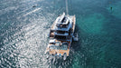 Luxury yacht jet ski dock on a clear blue ocean